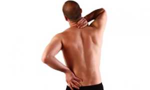 Почему периодически болит поясница у мужчин?