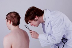 Осмотр у дерматолога