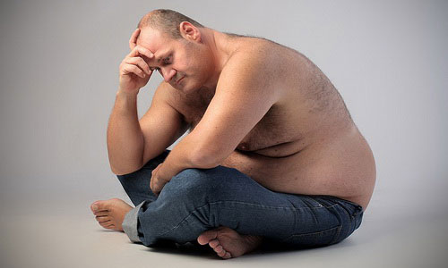 Мужчина с лишним весом Мужчина с лишним весом